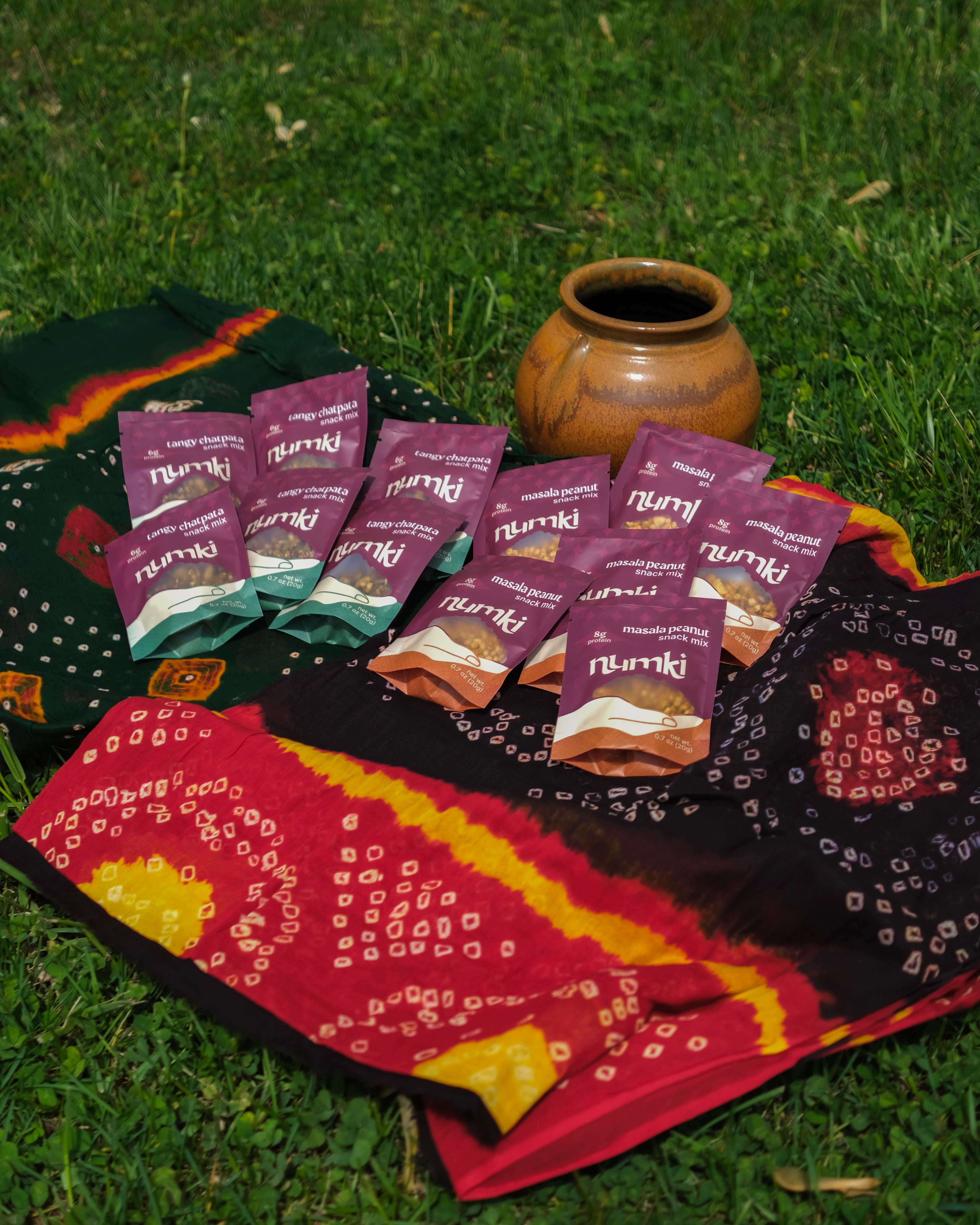 Numki Single Serving Multipacks on a grass field